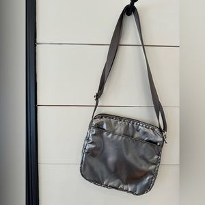 LeSportsac silver metallic cross body bag.